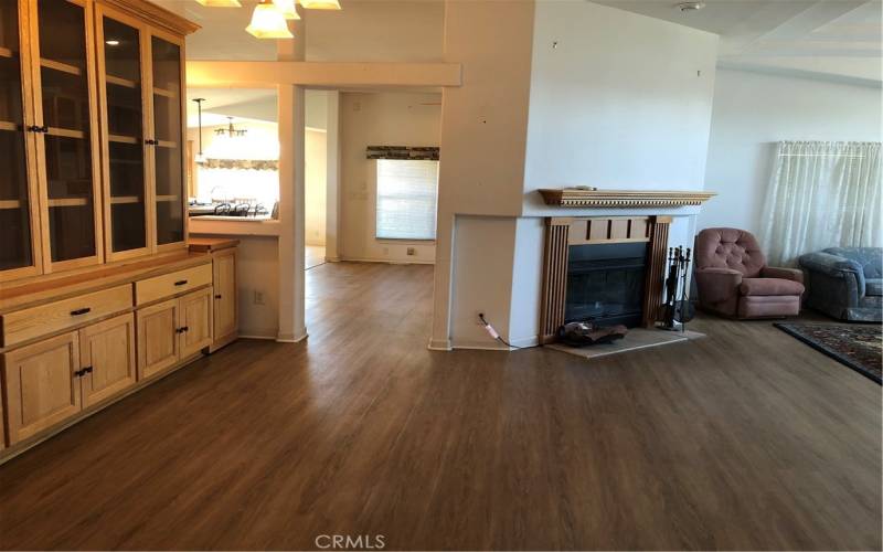 Living room on right is open to dining area.