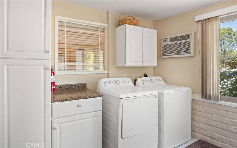 Laundry hookups with included Full size washer and dryer