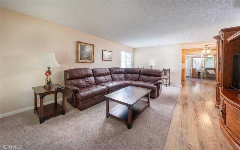 spacious living room with newer carpet