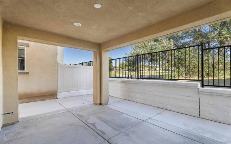 Low maintenance patio off the living room and front entry