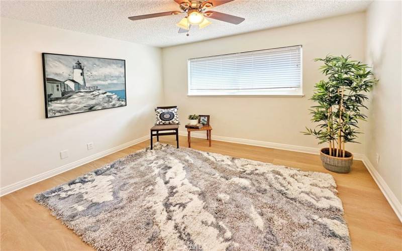 Third bedroom  with new flooring and paint is waiting for you to add your personal touches to this amazing home.