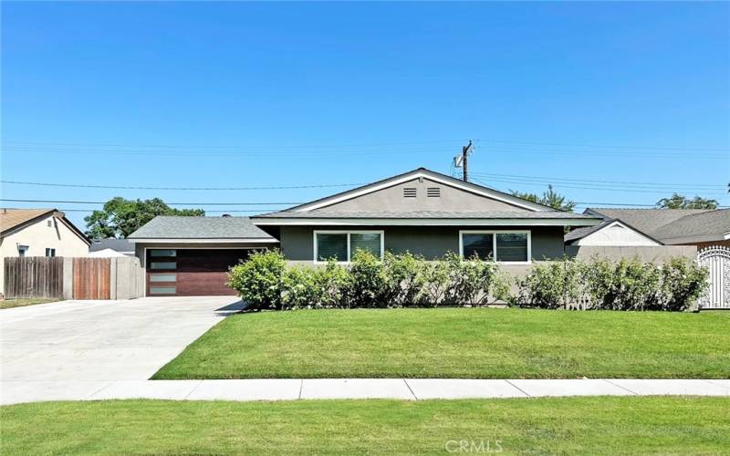 Brand New Garage Door and recent reroof and sheathing replacement highlight the exterior of this beautiful home with great curb appeal and a 3 car wide,48 foot extra long driveway for all your toys .