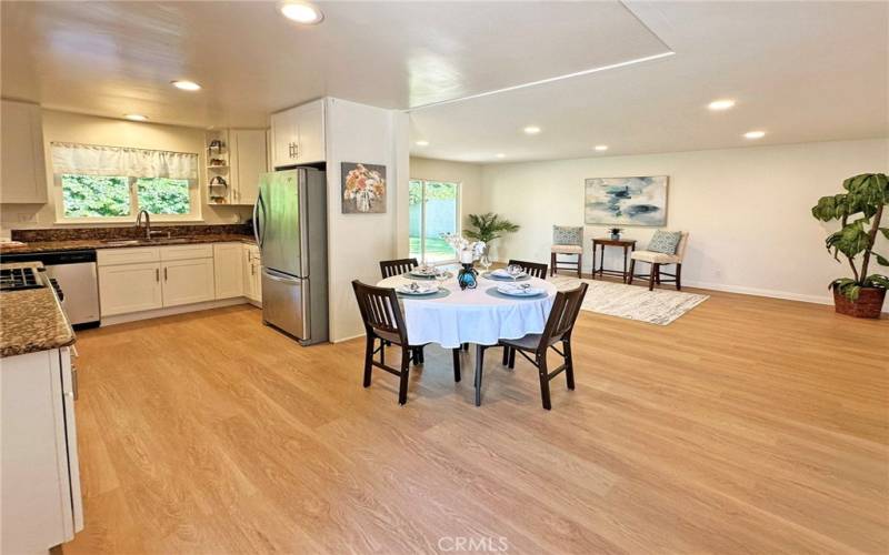 All new interior flooring, paint, and lighting in this open concept home.