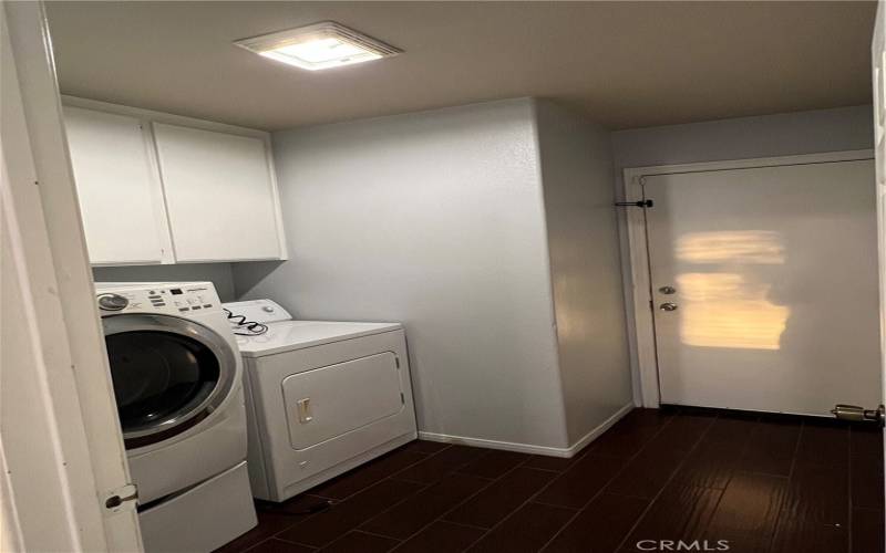 Laundry room includes shown washer/dryer