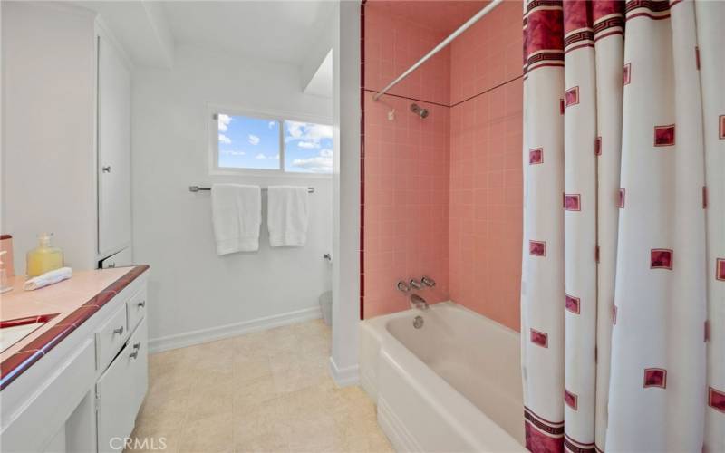 Full Bath in hallway with tub and shower