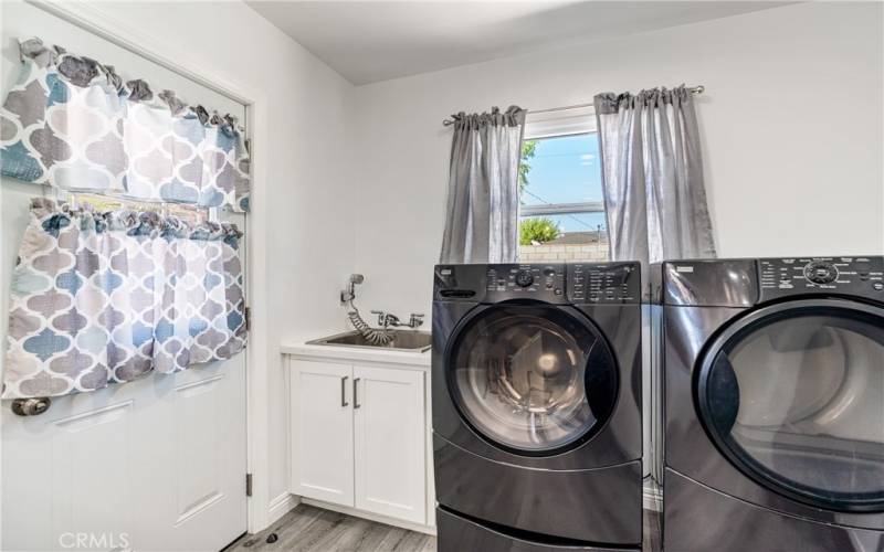 Laundry Area in Kitchen with Large Utility Sink