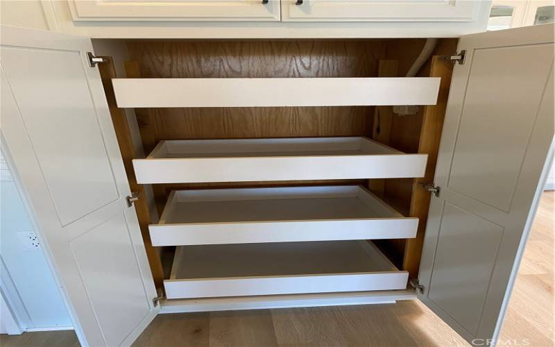 pantry in hall next to kitchen