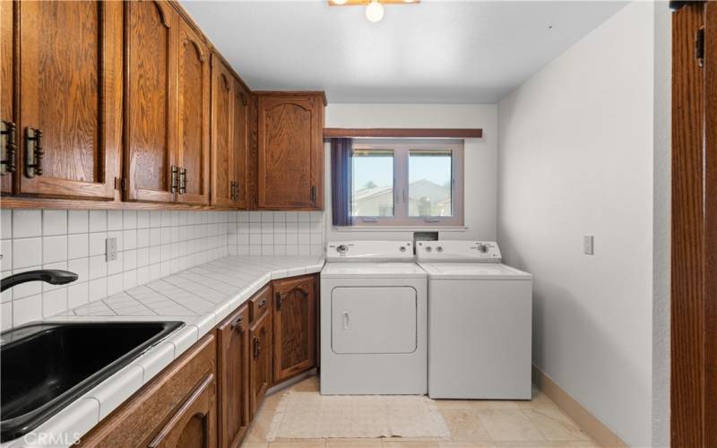 Large laundry room + 1/2 bath