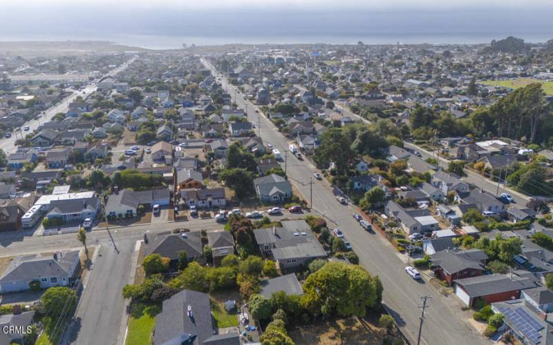 Aerial toward town and ocean