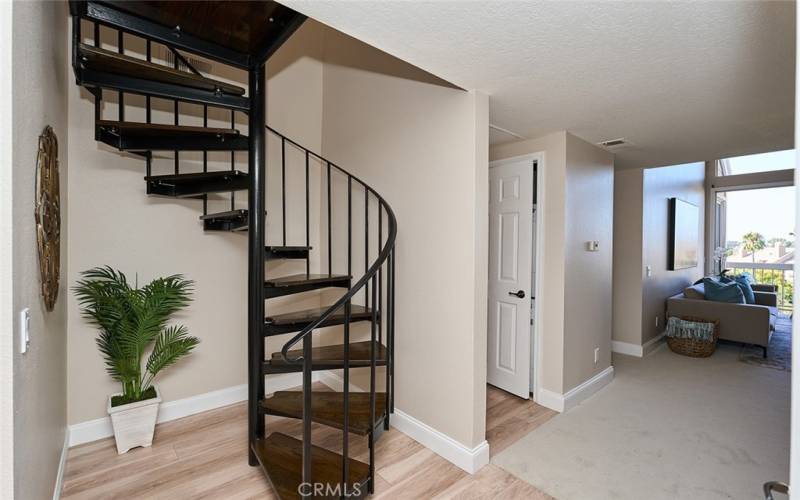 Spiral staircase to the impressive loft