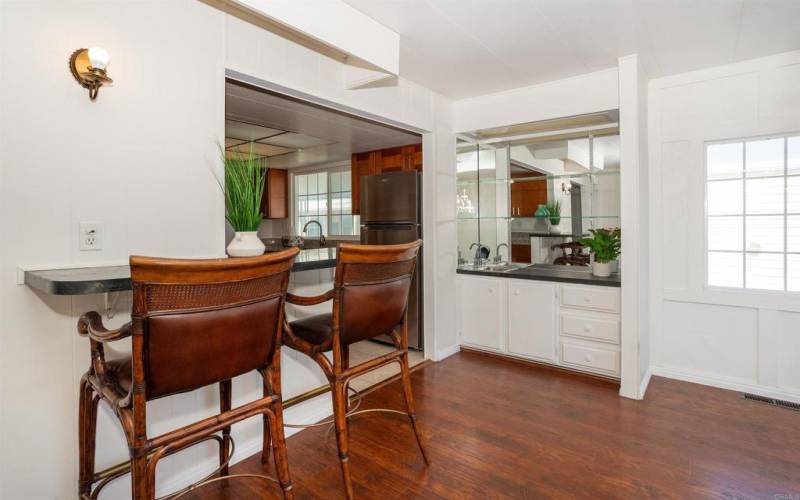 A wet bar & an eat at counter in the dining room.