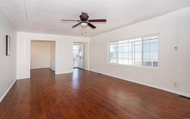 The front door entrance leads into the living room.