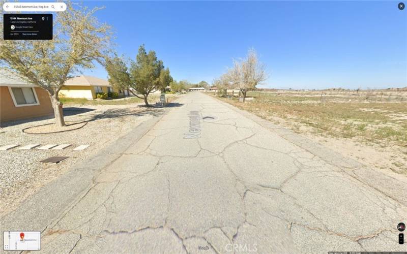 The Lot/ Land is right across the neighbors' Houses on left hand side.