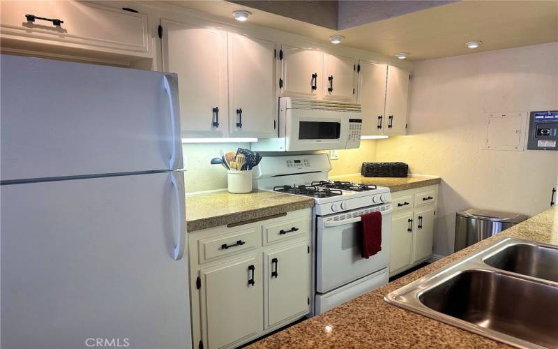 Painted cabinets and updated hardware give a clean and modern feel.