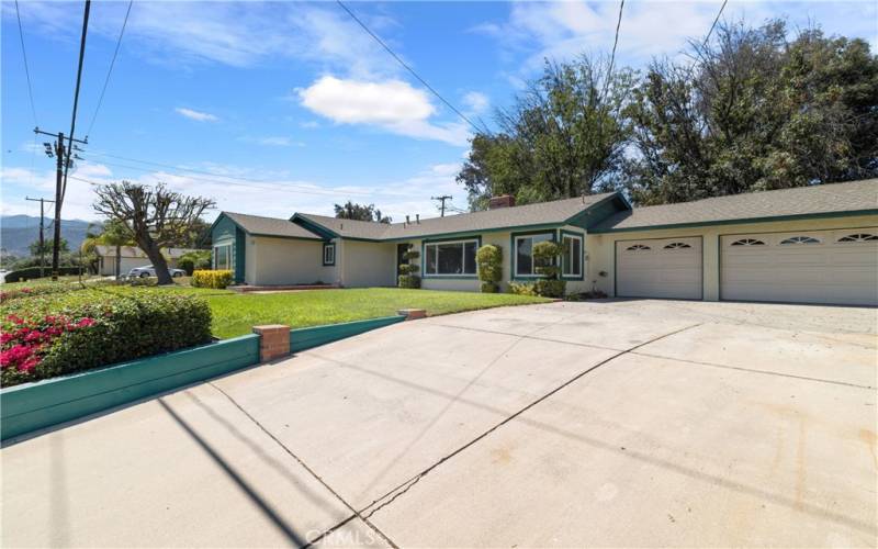 Spacious Front Yard with Garage and Driveway