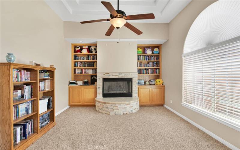 Library room with fireplace. Could be used as a formal dining room or formal living room.