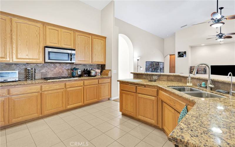 Vaulted ceilings with open and airy space. Lots of counter space for prep. Granite counters. Walk-in pantry.