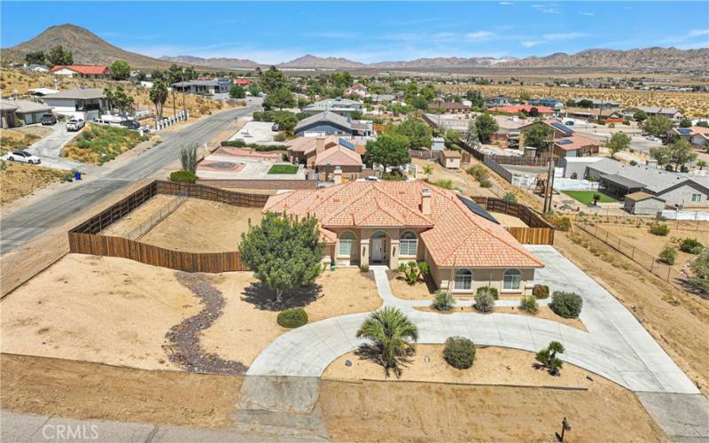 Private corner lot with views overlooking the valley. More parking space than you’ll ever need. 4 car garage with side approach. Gated RV parking.