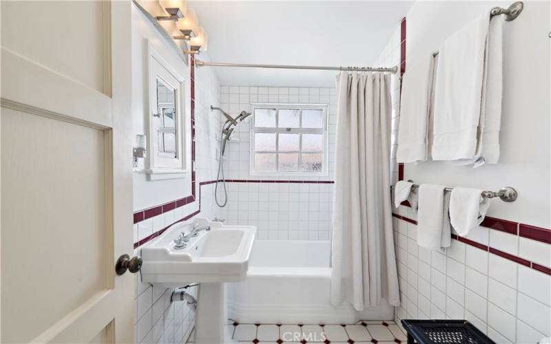 Bright tiled upper bathroom