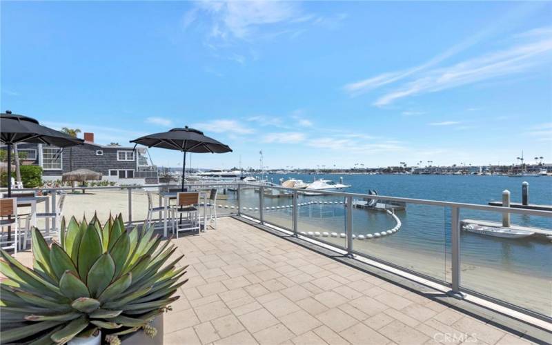 The clubhouse deck provides perfect outdoor dining and bay views