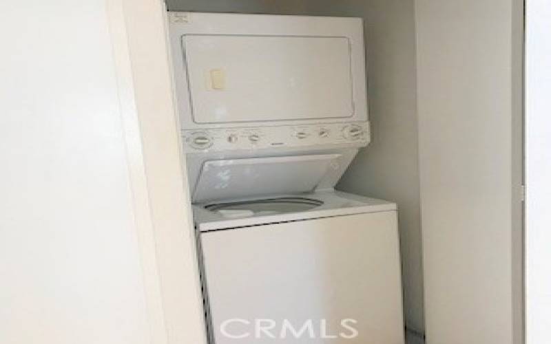 Stacked washer and dryer in hall closet!