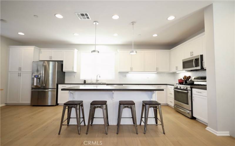 Kitchen with Shaker cabinets & Quartz countertops