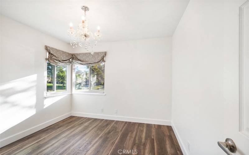 Second bedroom with crystal chandilier.