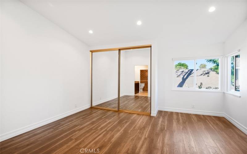 Primary bedroom and closet.