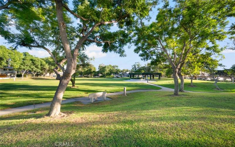 Peppertree park walkways to a large covered patio.