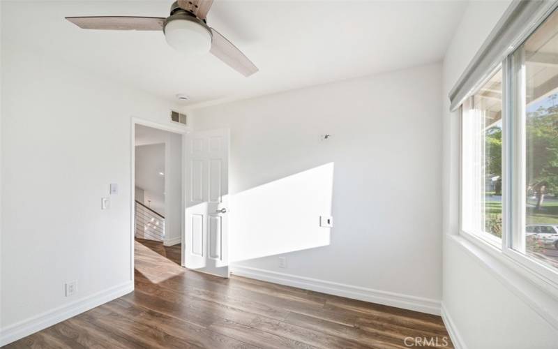 Third bedroom with view of park.