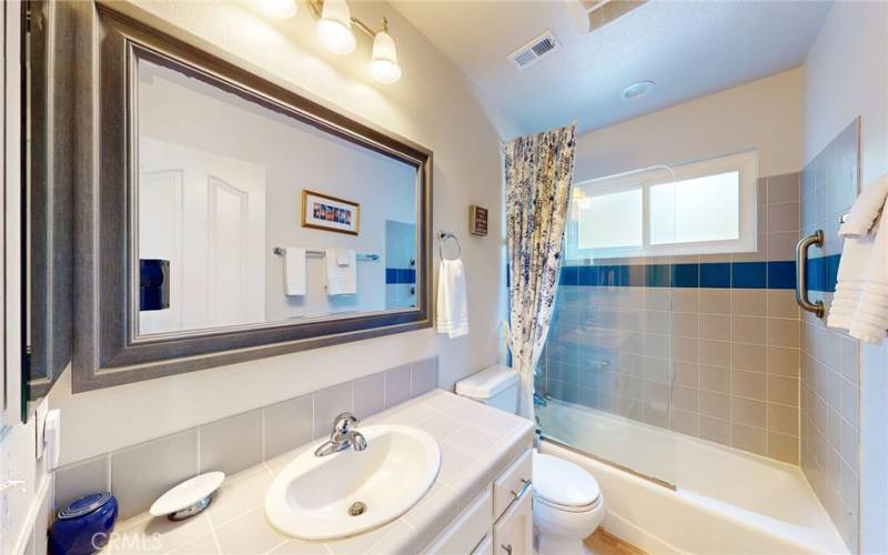 Master bath upstairs between the two bedrooms.