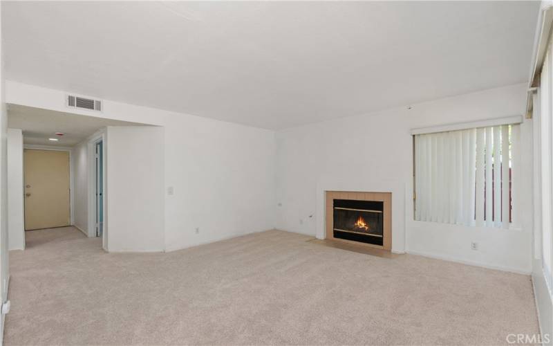 Family Room Looking towards Garage Entry and Downstairs Bedroom