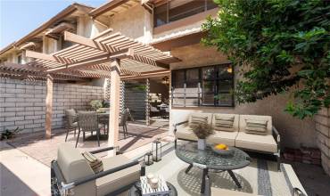 VIRTUALLY STAGED large  rear patio off of the dining area