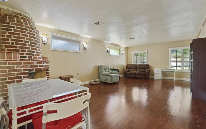 In-law quarters with a private front door entrance and French doors leading to the backyard.