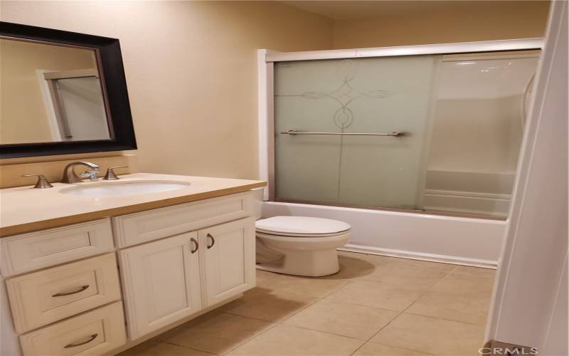 Shower over tub.