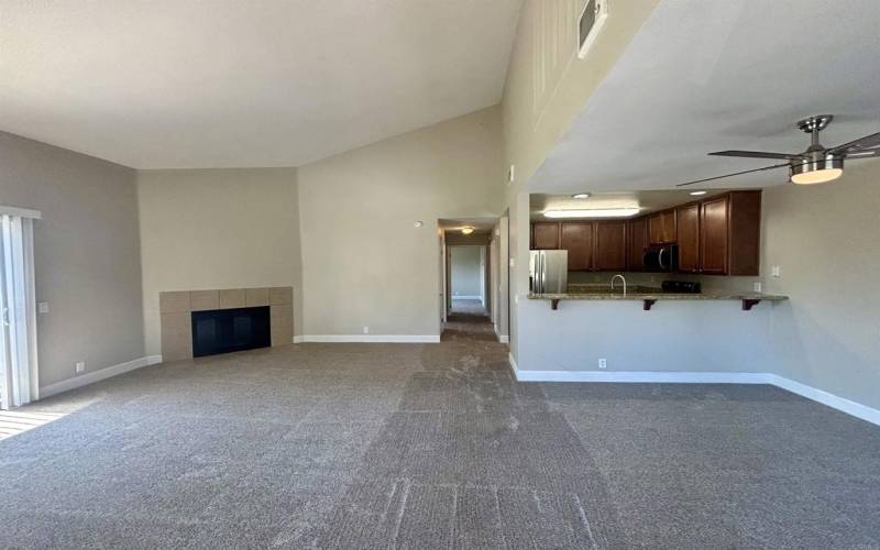 View from Front Door down the hallway showing the main living area as well