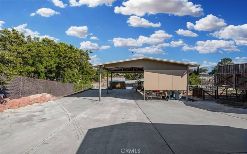 25’ x 25’ carport/hay cover with a 9’9” clearance