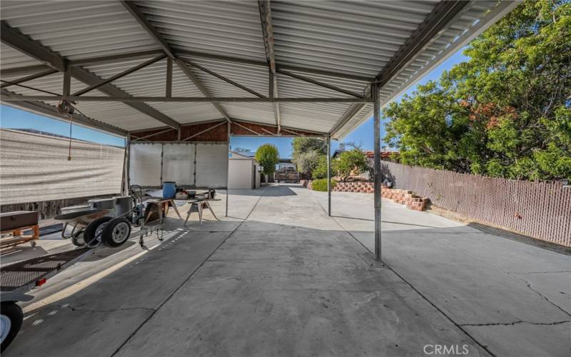 25’ x 25’ carport/hay cover with a 9’9” clearance