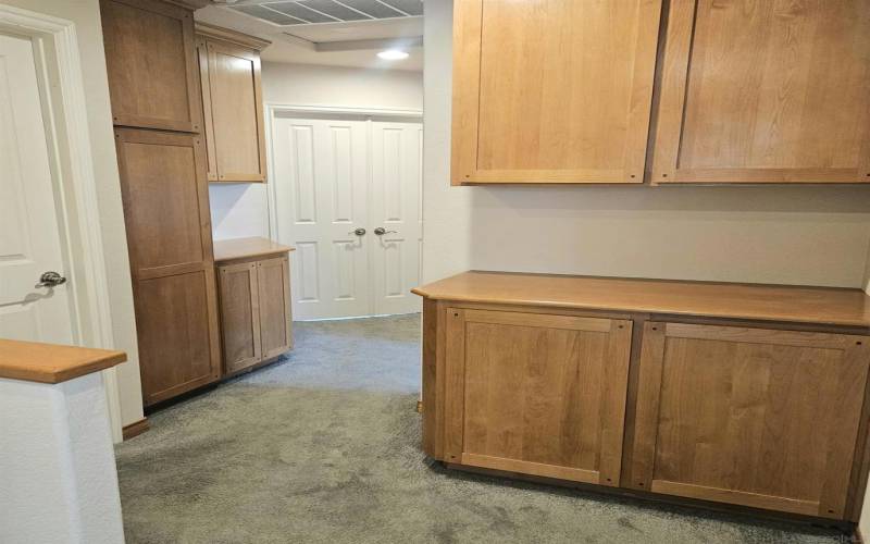 Upstairs storage outside bedrooms and laundry area.