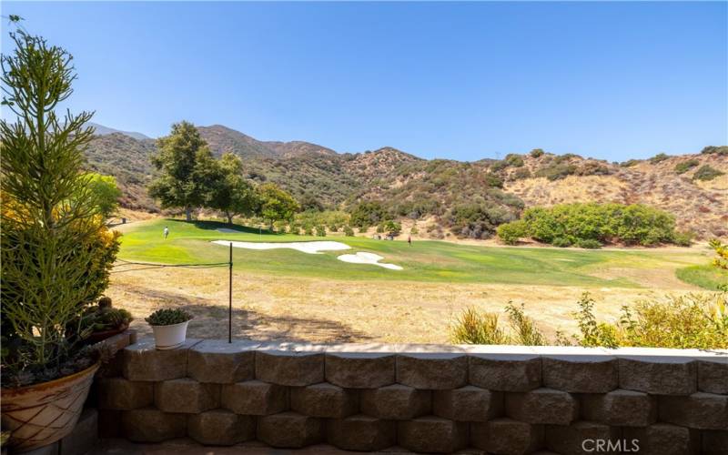 Golf course and mountain views.