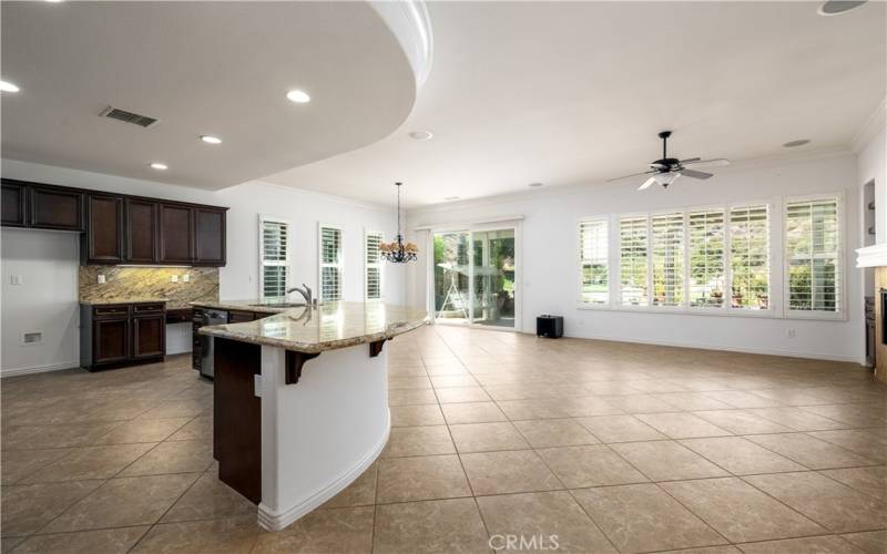 Open and spacious kitchen, eating area, and family room.