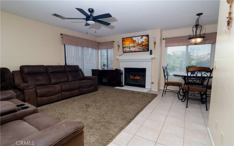 Family room with fireplace and eating area