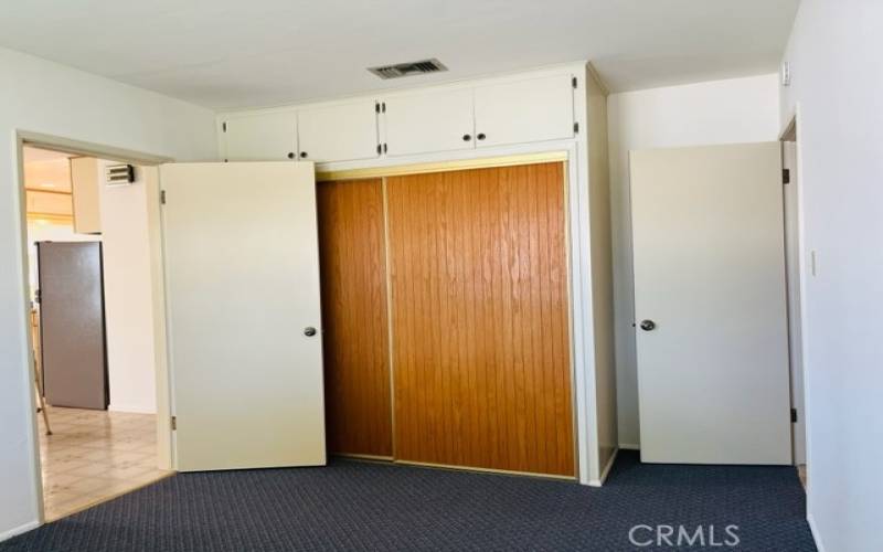 Walk-thru bedroom, enters from dining room and hallway