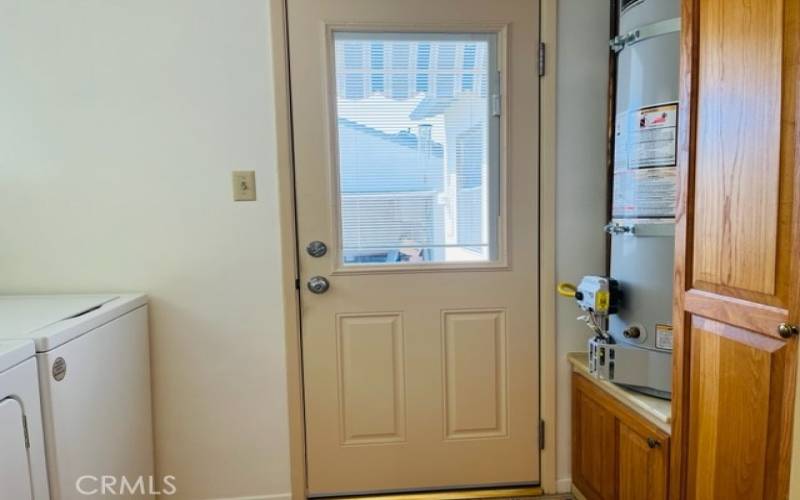 Laundry room door to backyard