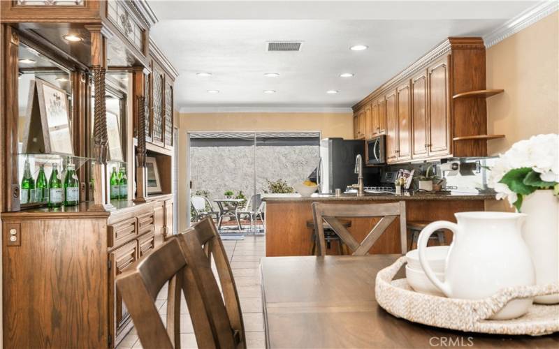 Warm and inviting kitchen with ample cabinet space and natural light