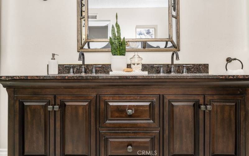 Spa-like vanity with double sinks and a touch of elegance