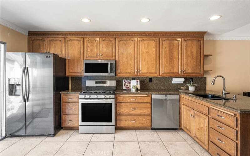 Gorgeous kitchen with stainless steel appliances and ample counter space