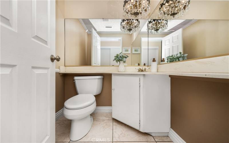 Spa-like powder room with elegant fixtures and ample natural light