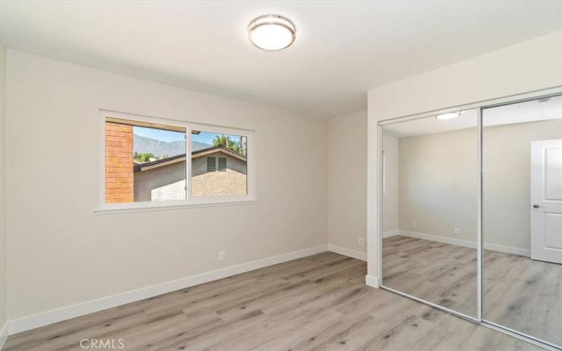 Third Bedroom with Mirrored Closet Door