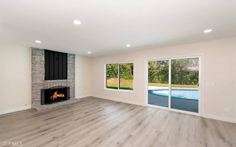 Family Room with Gas Fireplace and Recessed Lighting